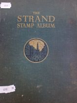 A STAMP ALBUM, CONTAINING A VARIETY OF WORLD STAMPS