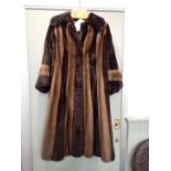 A HARROD'S GROSVENOR FUR COAT