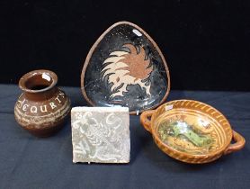 A SLIPWARE TWO-HANDLED DISH