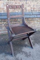 A VICTORIAN GOTHIC OAK CHAIR