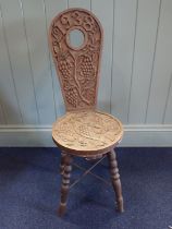 A 20TH CENTURY OAK 'SPINNING CHAIR'