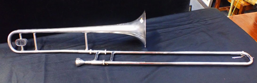 A BOOSEY & HAWKES SILVER COLOURED 'REGENT' TROMBONE