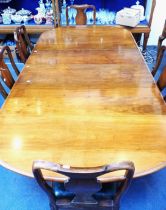 A 1930S GEORGE II STYLE DINING TABLE AND SIX CHAIRS