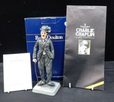 A ROYAL DOULTON FIGURE 'CHARLIE CHAPLIN' HN2771