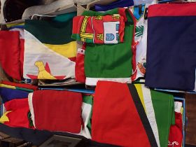 A LARGE QUANTITY OF INTERNATIONAL FLAGS