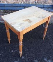 A SMALL VICTORIAN PINE KITCHEN TABLE