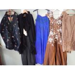 A QUANITITY OF VINTAGE DRESSES