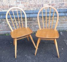 ERCOL: A PAIR OF BLOND ELM AND BEECH WINDSOR CHAIRS