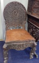 A 19TH CENTURY ANGLO-INDIAN CARVED HARDWOOD CHAIR