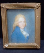 A MINIATURE PORTRAIT PAINTED ON IVORY