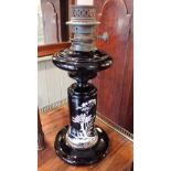 A 19TH CENTURY BLACK OPAQUE GLASS OIL LAMP: THE SILBER LIGHT COMPANY