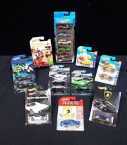 A COLLECTION OF CARDED AND BOXED HOTWHEELS DIE CAST CARS
