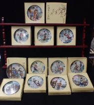 A SET OF TWELVE 'BEAUTIES OF THE RED MANSION' PLATES