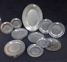 AN ANTIQUE PEWTER OVAL PLATE BY BUSH AND PERKINS