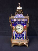 A CHINESE BRASS AND CLOISONNE CASED CLOCK