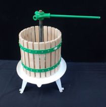 AN APPLE/CIDER PRESS, ENAMELLED STEEL BASE