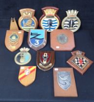 A COLLECTION OF NAVAL PLAQUES