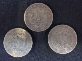 THREE BOLIVIAN SILVER COINS