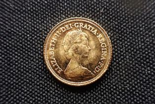 A 1982 QUEEN ELIZABETH II GOLD HALF SOVEREIGN