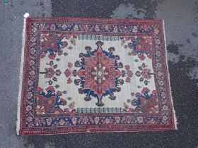 AN ANTIQUE N. W. PERSIAN RUG