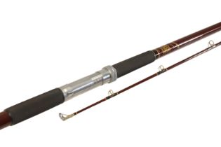 HARDY BROS: A TOURNEY BEACHCASTER TWO PIECE CARBON ROD