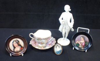 A DRESDEN CUP AND SAUCER