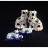 PAIR OF STAFFORDSHIRE STYLE DOGS