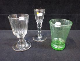 A DRINKING GLASS WITH BUCKET BOWL AND FACETED STEM