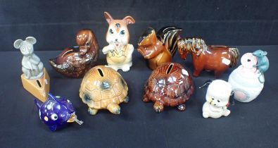 A COLLECTION OF KITSCH CERAMIC MONEY BANKS, C. 1970s