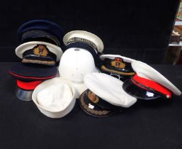 A COLLECTION OF MILITARY HATS