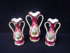 A GARNITURE OF THREE SEVRES STYLE VASES