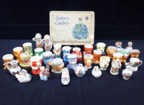 A COLLECTION OF EARLY 20TH CENTURY NOVELTY EGGCUPS