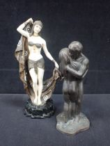 AN ART DECO STYLE FIGURE