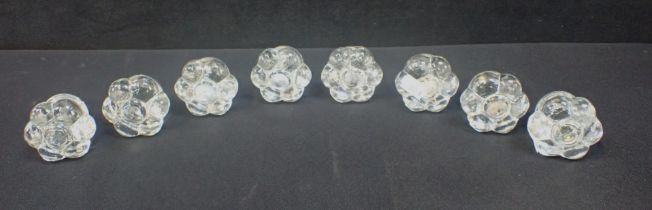 A SET OF EIGHT VICTORIAN MOULDED GLASS DRAWER KNOBS