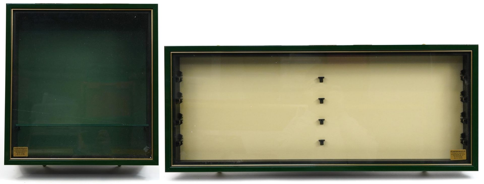 Two wall hanging glass fronted display cases, the largest 76cm wide