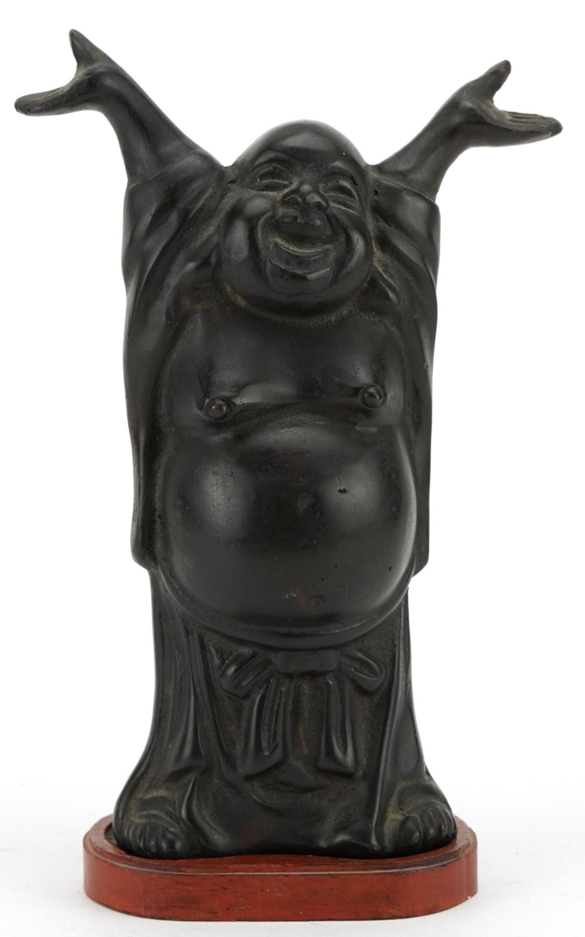 Chinese patinated bronze figure of Buddha raised on a hardwood stand, 19cm high