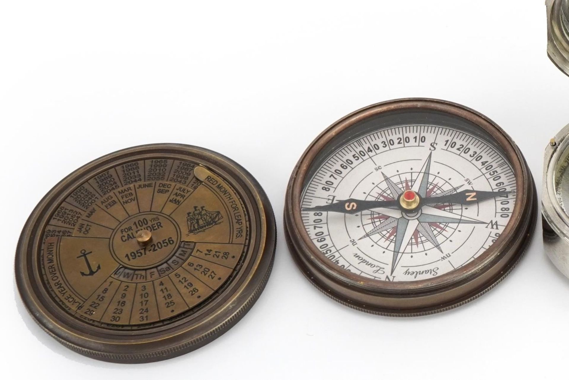 Three naval interest compasses including one with perpetual calendar, the largest 7.8cm in diameter - Bild 3 aus 5