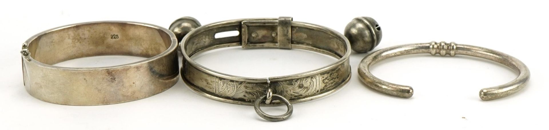 Three silver bangles and bracelets, one with bells, total 76.4g - Image 2 of 3