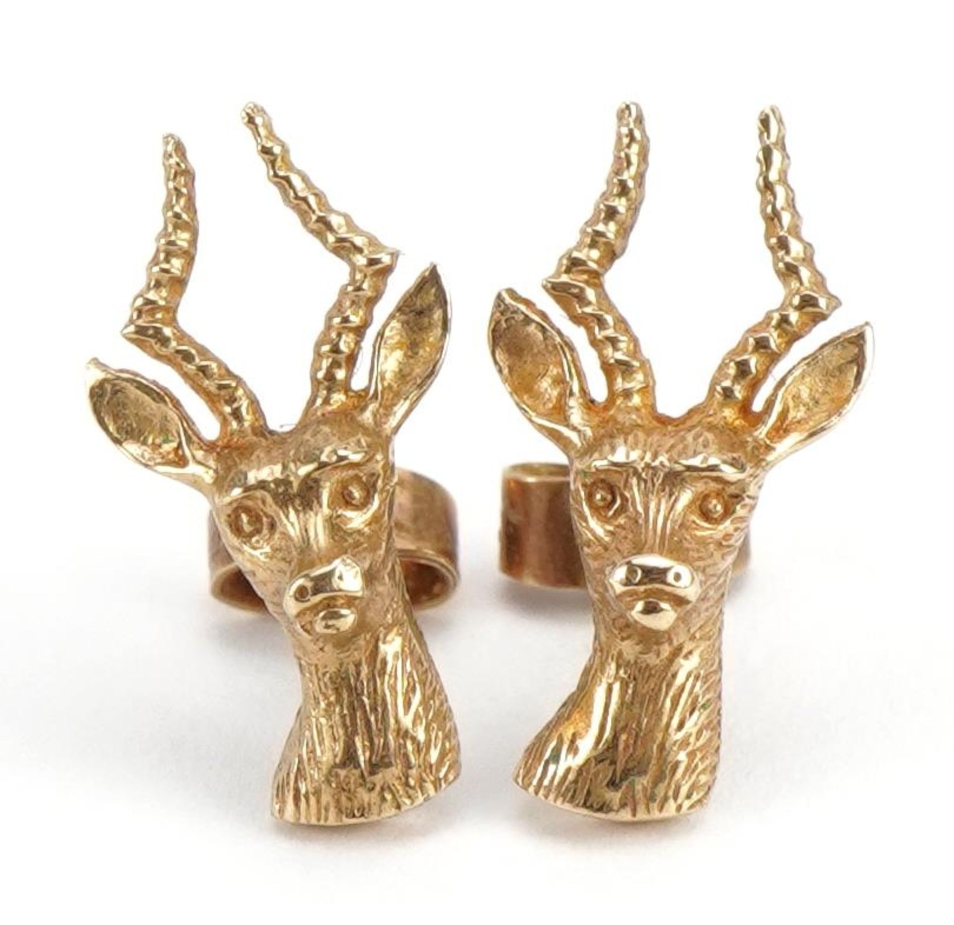 Pair of 9ct gold gazelle stud earrings, 1.8cm high, 2.2g