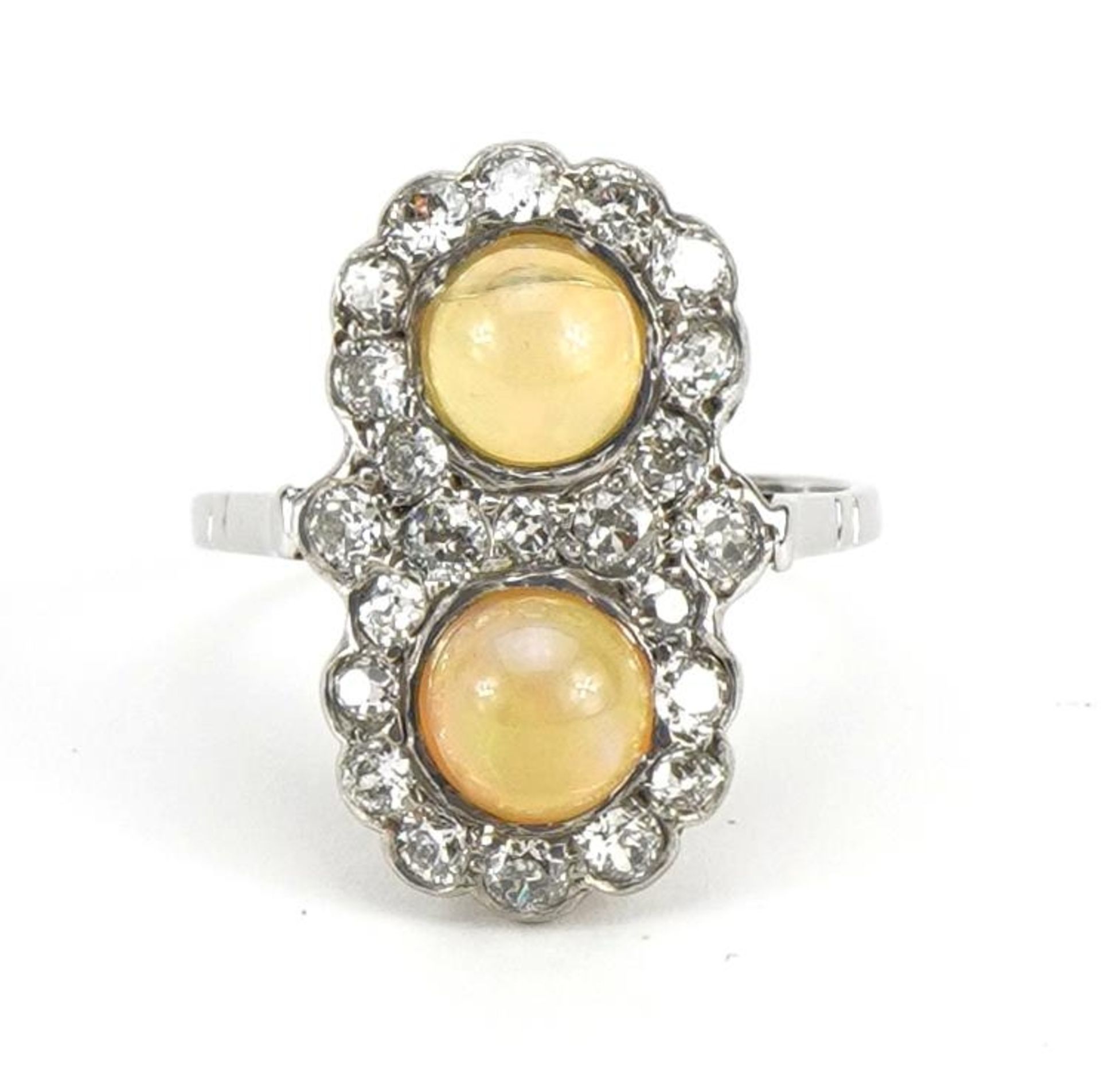 Victorian style 18ct white gold diamond cluster ring set with two cabochon opals, total opal