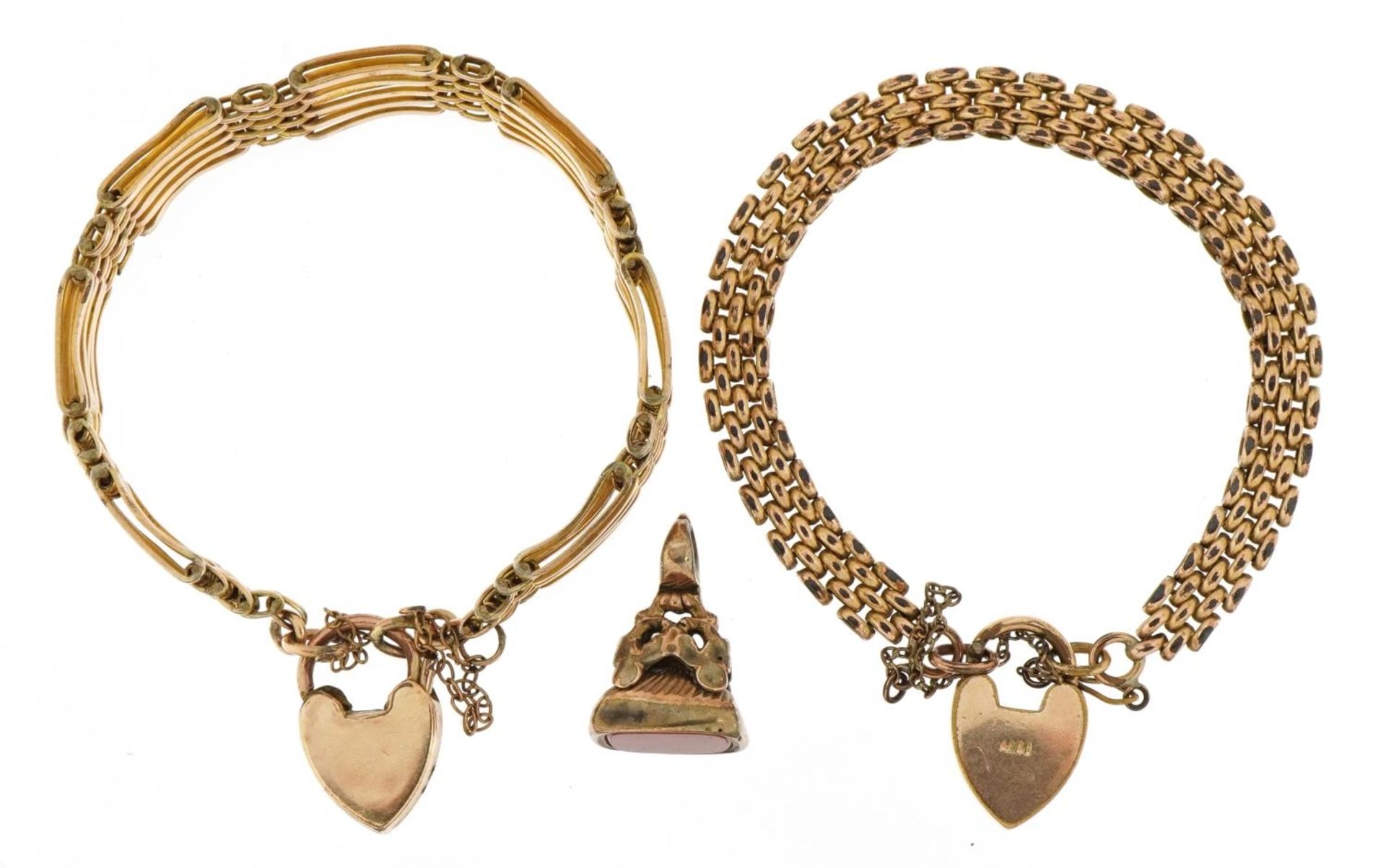 Two gold plated bracelets with love heart shaped padlocks and an antique yellow metal carnelian fob - Image 2 of 4