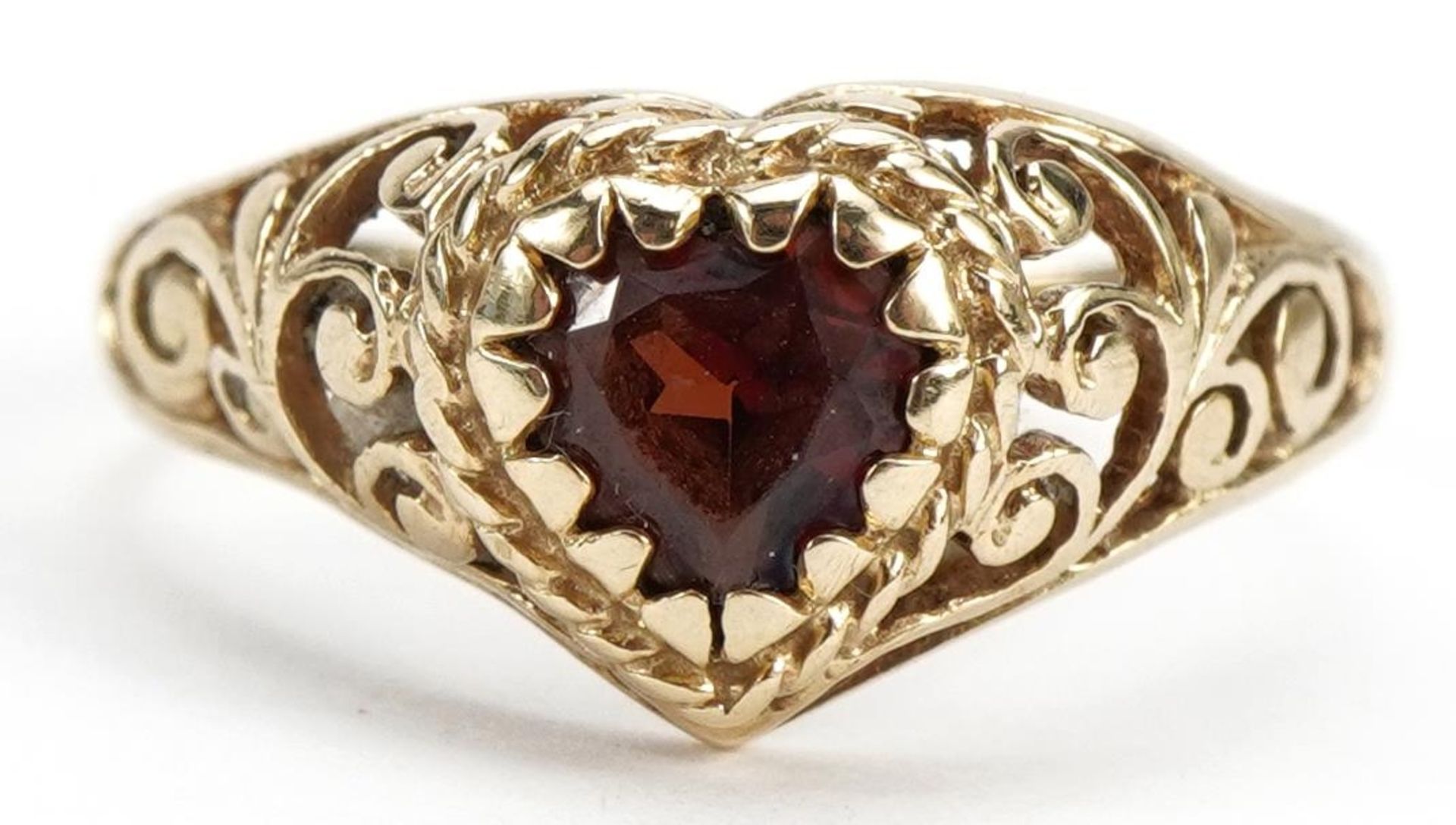 9ct gold garnet love heart ring with pierced shoulders, size I/J, 1.4g