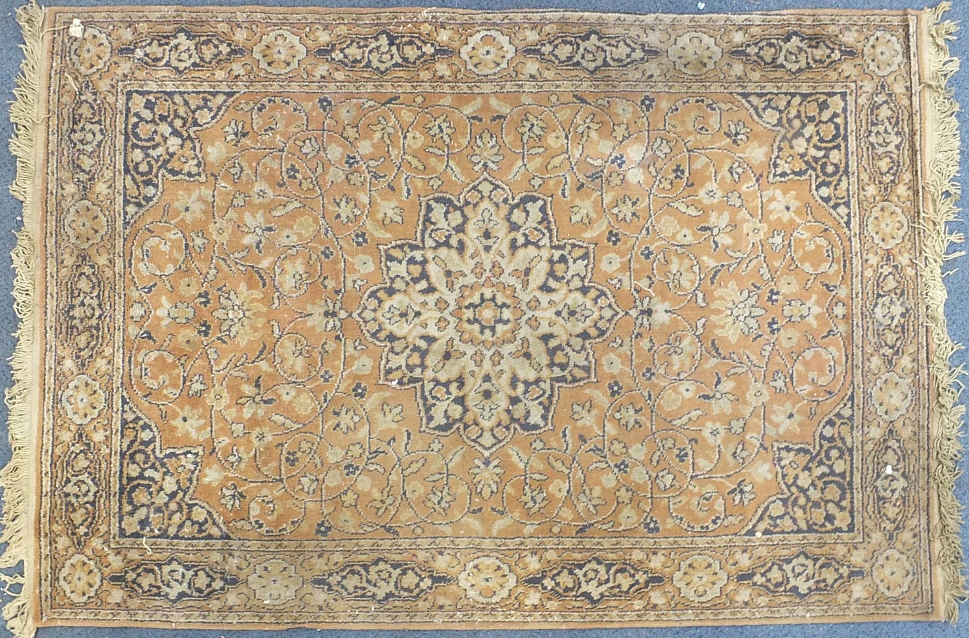 Rectangular Persian brown ground rug having an all over floral design, 165cm x 115cm
