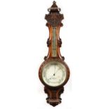 Carved oak barometer, the dial inscribed Chadburns Ltd, 47 Castle Street Liverpool, 85cm high