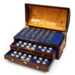 Collection of United States uncirculated quarters by The Danbury Mint housed in a treasure chest