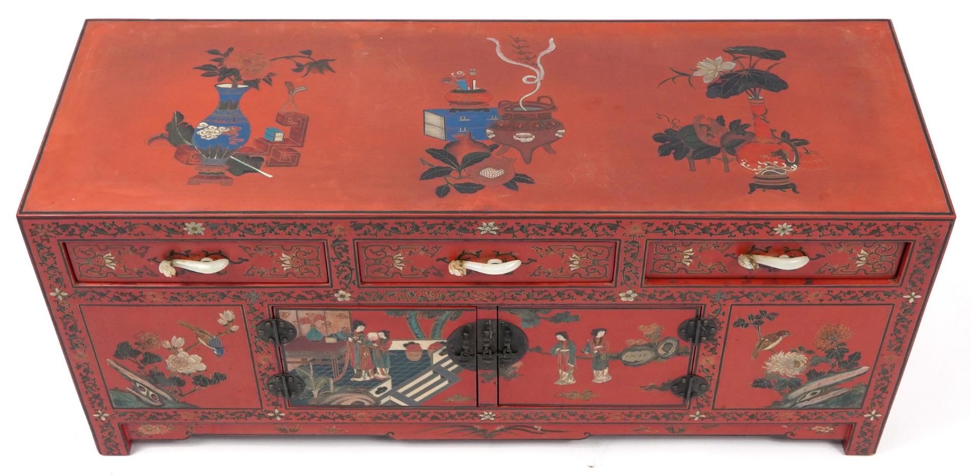 Chinese red lacquered chinoiserie side cabinet with carved hardstone handles, 49cm H x 110cm W x - Image 3 of 4