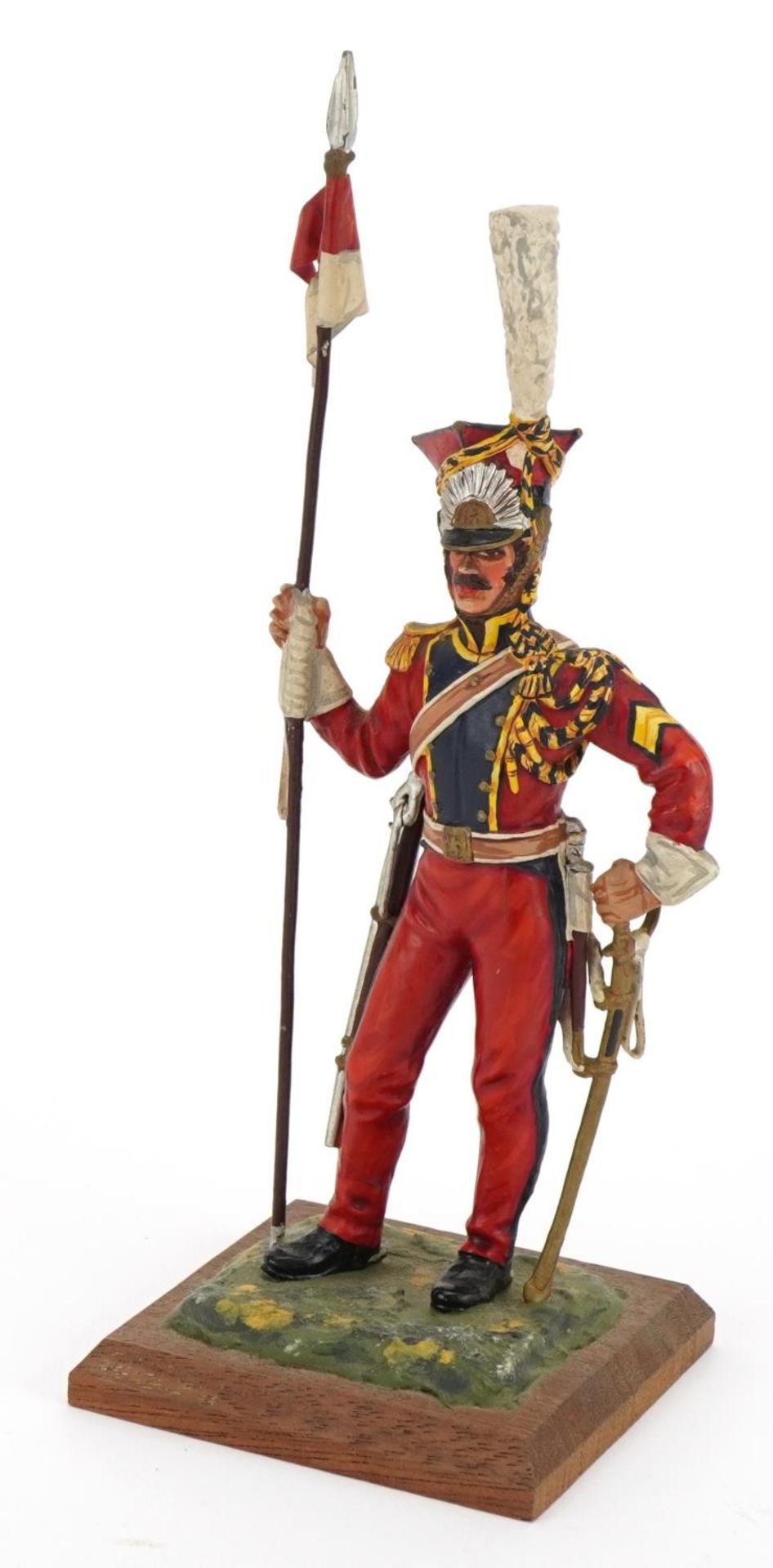 Hand painted cast metal figure of a soldier in uniform, 21cm high