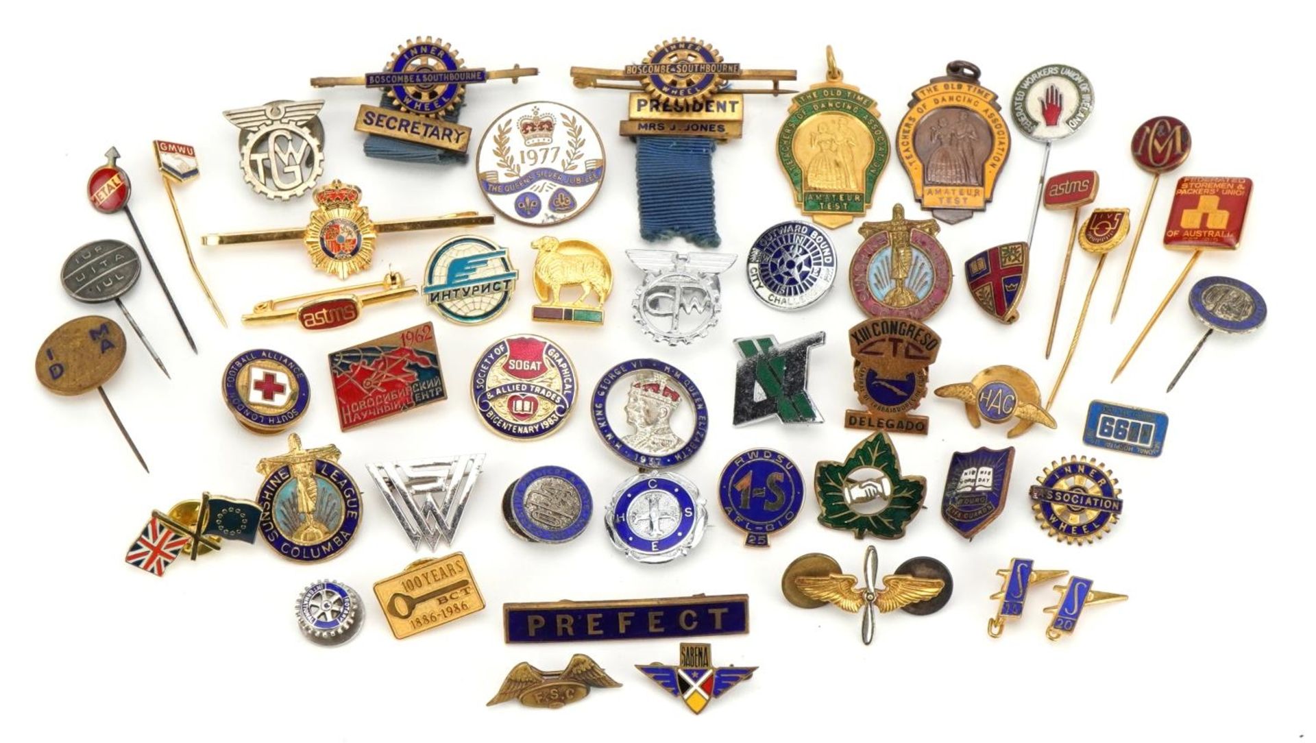 Collection of vintage and later enamel badges and stickpins including Inner Wheel Association and