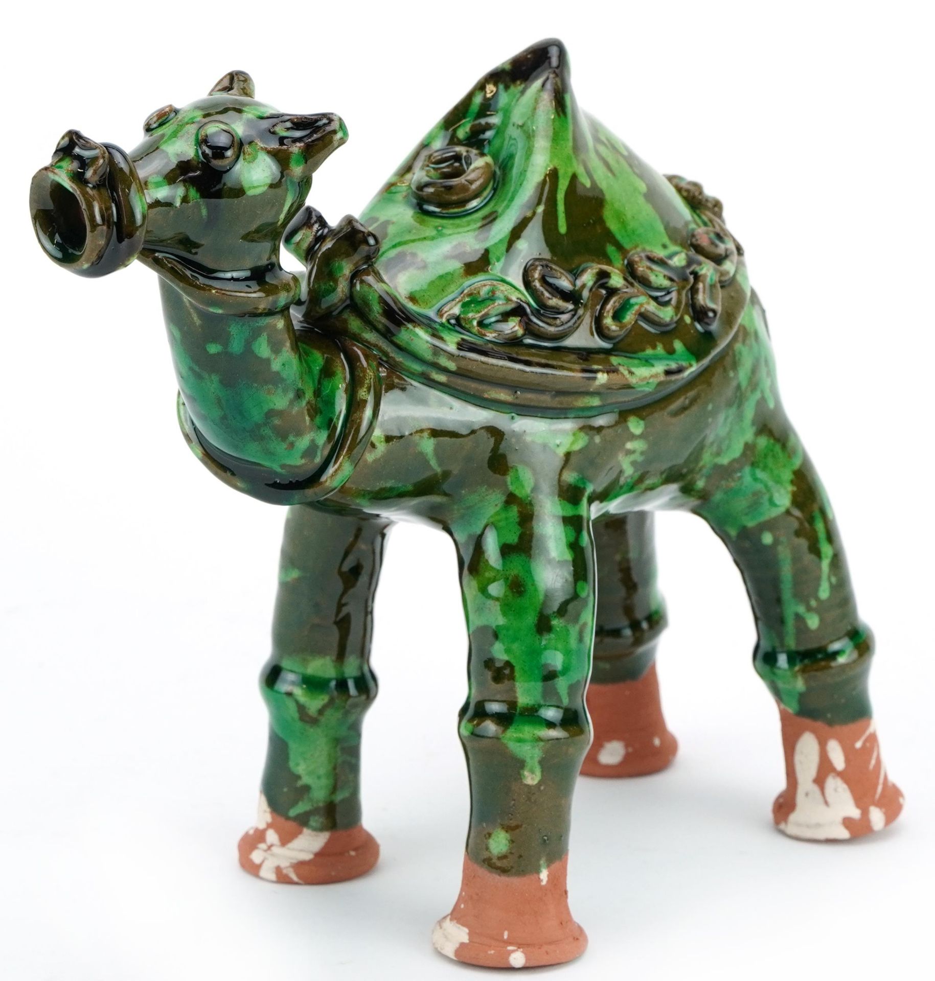 Turkish Canakkale pottery camel ewer, having a green glaze, 19cm in length