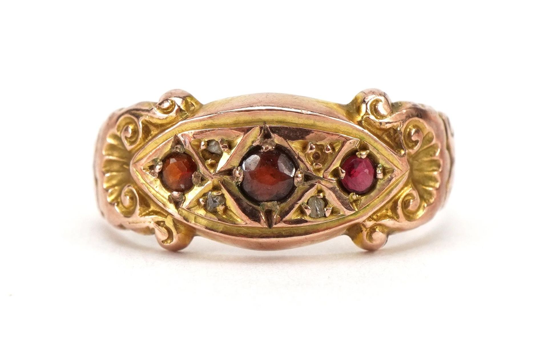 Victorian 22ct gold garnet and diamond boat ring with scrolled shoulders, indistinct hallmarks, size